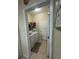 Convenient laundry room with washer, dryer, and storage for efficient household tasks and organization at 3205 Sonesta Ct # B, Clermont, FL 34711