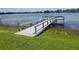 Private community pier on the lake providing a relaxing spot to enjoy the water view and tranquility at 1550 11Th Ne St # G8, Winter Haven, FL 33881