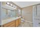 Bathroom featuring a shower, bathtub, toilet, sink with vanity, and neutral decor at 2448 Brownwood Dr, Mulberry, FL 33860