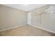 Bedroom with carpet flooring, white walls and white trim at 2448 Brownwood Dr, Mulberry, FL 33860