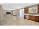 Bright open kitchen area with stainless appliances and a breakfast bar, perfect for everyday living at 2448 Brownwood Dr, Mulberry, FL 33860