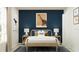 Cozy bedroom featuring stylish decor, comfortable bed, and ample lighting for a relaxing space at 1333 Acorn Meadow Loop, Eustis, FL 32726