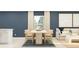 Bright dining area featuring a modern table, comfortable chairs, and stylish decor in an open-concept space at 1333 Acorn Meadow Loop, Eustis, FL 32726