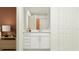 Bathroom featuring white vanity, neutral walls, and modern fixtures at 1373 Acorn Meadow Loop, Eustis, FL 32726