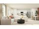 Bright and airy living area flows from kitchen featuring an L-shaped sectional and decorative elements at 1373 Acorn Meadow Loop, Eustis, FL 32726