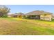 The property features a well-maintained lawn and screened-in patio, perfect for outdoor relaxation at 2522 Pine Valley Dr, Lakeland, FL 33810