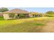 Expansive backyard showcasing lush lawn and mature landscaping, perfect for outdoor enjoyment at 2522 Pine Valley Dr, Lakeland, FL 33810