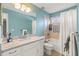 Bright bathroom with a vanity, tiled shower/tub, and ample counter space at 2522 Pine Valley Dr, Lakeland, FL 33810