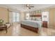 Serene bedroom with a large window, comfortable king bed, and stylish decor at 2522 Pine Valley Dr, Lakeland, FL 33810