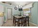 Inviting breakfast nook featuring a granite table, stylish chairs, and natural light from the window at 2522 Pine Valley Dr, Lakeland, FL 33810
