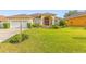 Charming single Gathering home displaying a beautiful lawn and front garden at 2522 Pine Valley Dr, Lakeland, FL 33810