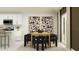 Bright dining area connected to the kitchen, features a wooden table and modern decor at 2192 Albatross Nest Dr, Bartow, FL 33830