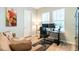 Home office features a work desk, ergonomic chair, and two large bright windows at 7418 Barrier Cove Way, Celebration, FL 34747