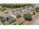 Aerial view of the house displaying its location within a well-established neighborhood at 5597 Forest Ridge Dr, Winter Haven, FL 33881