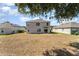 Spacious backyard offering plenty of room for outdoor activities and entertaining at 5597 Forest Ridge Dr, Winter Haven, FL 33881