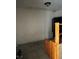 A damaged living room with a damaged wall, damaged floors, and a damaged ceiling at 10931 Pathfinder Trl, Lakeland, FL 33809