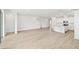 Large, open-concept living space with modern flooring and bright white walls at 16998 Cedar Valley Cir, Clermont, FL 34711