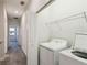 Convenient laundry area equipped with a modern washing machine and dryer set at 1209 Payne Stewart Dr, Davenport, FL 33896