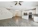 Spacious living room with an open floor plan and an eat-in kitchen at 1209 Payne Stewart Dr, Davenport, FL 33896