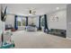 Large bonus room with carpet, big windows, a large television, and plenty of open space for play at 12243 Sawgrass Reserve Blvd, Orlando, FL 32824