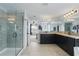 View of the main bathroom featuring a glass shower and double sink vanity at 12243 Sawgrass Reserve Blvd, Orlando, FL 32824