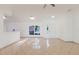 Bright living room with neutral walls, ceramic tile flooring, and natural light at 1472 Muir Cir, Clermont, FL 34711