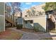 An exterior view features the home's entrance, a small landscaped area and stairwell at 337 Scottsdale Sq # 337, Winter Park, FL 32792