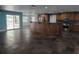 Open-concept kitchen with island, stainless steel appliances, and easy access to the living area at 4506 Se 7Th Pl, Ocala, FL 34471