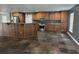 Spacious kitchen features custom wood cabinets, stainless steel appliances, and large island at 4506 Se 7Th Pl, Ocala, FL 34471