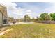 Backyard features a fenced-in yard, a pool, and patio furniture at 14791 Sw 29Th Avenue Rd, Ocala, FL 34473