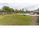 Backyard features a fenced-in yard, a pool, and patio furniture at 14791 Sw 29Th Avenue Rd, Ocala, FL 34473