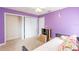 Bedroom features include a ceiling fan, closet, and daybed at 14791 Sw 29Th Avenue Rd, Ocala, FL 34473