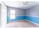 Well-lit bedroom with large window and door at 14791 Sw 29Th Avenue Rd, Ocala, FL 34473