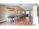 Bright and airy dining room with wood floors, a stylish table set, and a large hutch at 14791 Sw 29Th Avenue Rd, Ocala, FL 34473