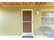 Inviting front entrance with a stylish door and a welcoming flamingo-themed doormat at 14791 Sw 29Th Avenue Rd, Ocala, FL 34473