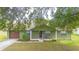 Charming single-story home with a well-manicured front yard and a welcoming entrance at 14791 Sw 29Th Avenue Rd, Ocala, FL 34473