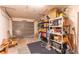 View of the garage with shelves and door at 14791 Sw 29Th Avenue Rd, Ocala, FL 34473