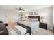 Spacious bedroom features a ceiling fan, a large bed with matching furniture, and a work-from-home space at 3387 Tawny Grove Pl, Lakeland, FL 33811