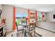 Cozy dining area features scenic views and bright natural light at 3387 Tawny Grove Pl, Lakeland, FL 33811