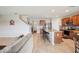 Modern kitchen featuring granite countertops, stainless steel appliances, and barstool seating at the island at 3387 Tawny Grove Pl, Lakeland, FL 33811