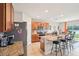 Kitchen features granite countertops, stainless steel appliances, and large island at 3387 Tawny Grove Pl, Lakeland, FL 33811