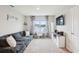 Upstairs living area featuring neutral walls, carpet flooring, and a great water view at 3387 Tawny Grove Pl, Lakeland, FL 33811