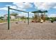 Community playground featuring swings, slides, and climbing structures for Gathering fun at 3387 Tawny Grove Pl, Lakeland, FL 33811