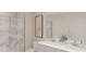 Elegant bathroom with a double vanity, a glass-enclosed shower, and modern fixtures at 4747 Golden Knight Blvd, Kissimmee, FL 34746
