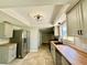 Modern kitchen featuring sleek countertops, stainless steel appliances, and ample cabinet space at 3465 Peacock Ln, Mulberry, FL 33860