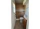 Bathroom featuring tiled shower with grab bar and seat, tiled floor, and vanity with sink at 3640 Chart Prine Rd, Lakeland, FL 33810