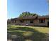 Charming single story home featuring a well-maintained lawn and a classic exterior with shuttered windows at 3640 Chart Prine Rd, Lakeland, FL 33810