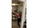 A garage with a table set up in the middle for a workspace at 4707 Melody Ln, Lakeland, FL 33805