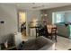 View of the living room with tile floors, showing the open floor plan at 4707 Melody Ln, Lakeland, FL 33805