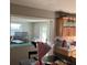 View of the living room and kitchen area featuring an open layout at 4707 Melody Ln, Lakeland, FL 33805